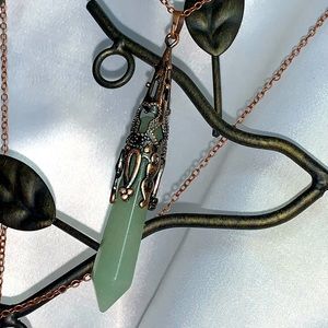 Aventurine and copper pendant in a copper …